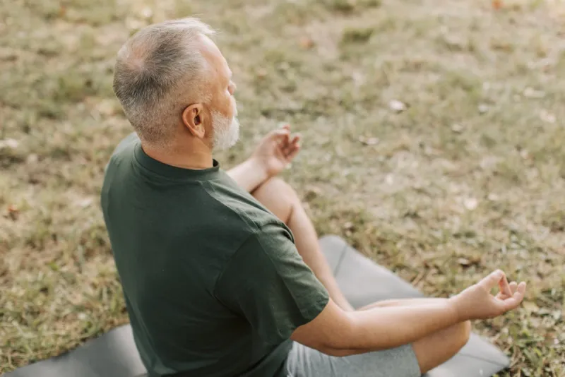 Senior woman exercising with dumbbells for joint health